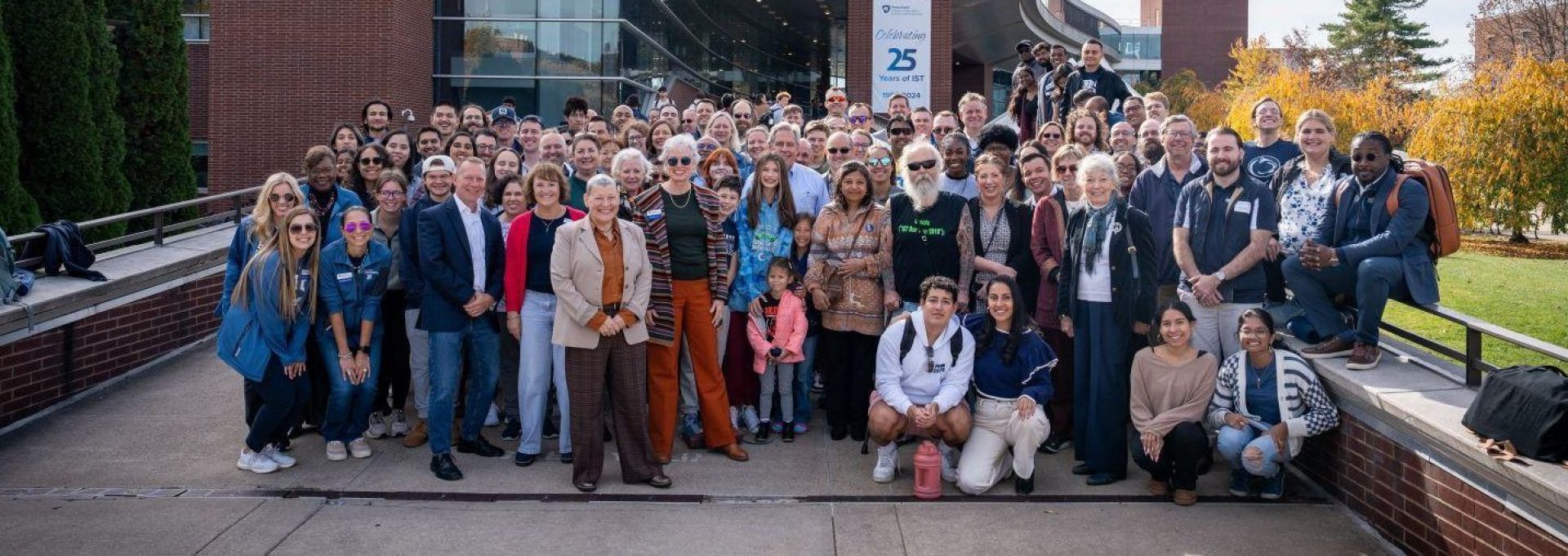 Alumni and friends in front of the Westgate Building.